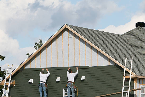 Professional Siding Repair technician working in Pikesville, MD